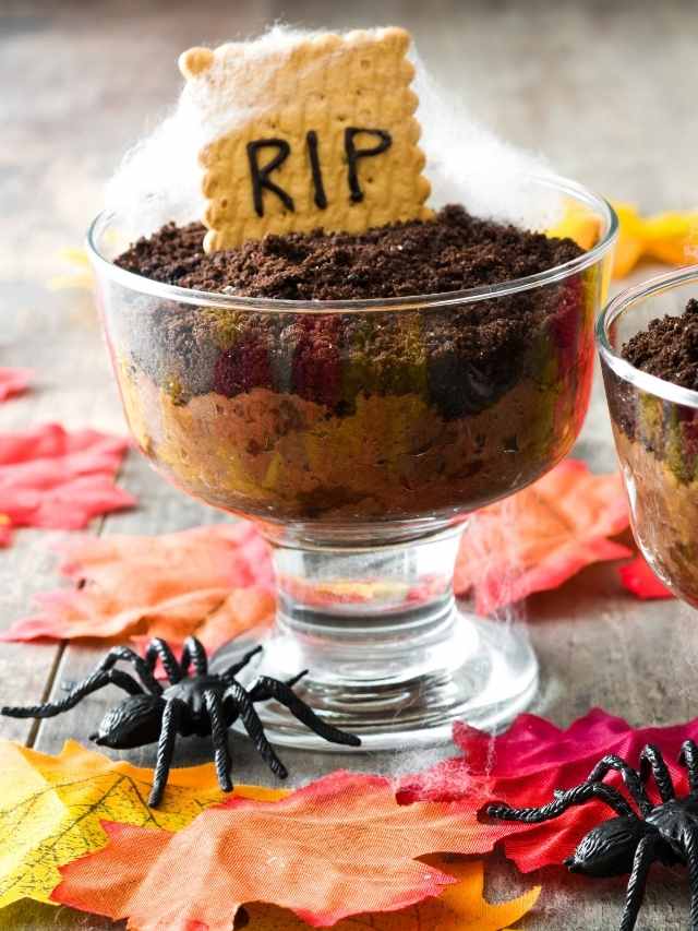 Two bowls of halloween desserts with a sign saying rip.