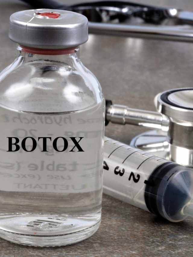 A bottle of botox next to a stethoscope and a stethoscope.