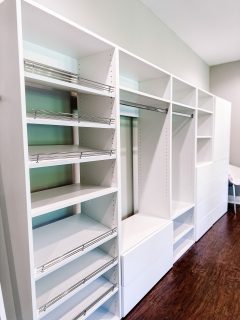 A white modular closet with shelves and drawers, perfect for creating a versatile home cloffice setup.