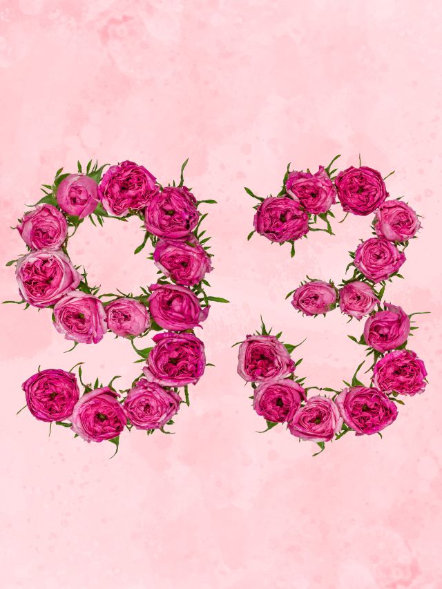 Pink roses make up the letter e on a pink background.