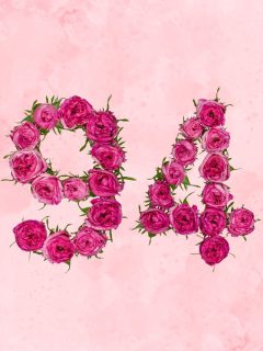 The meaning of angel number 94 is portrayed through pink roses on a pink background.