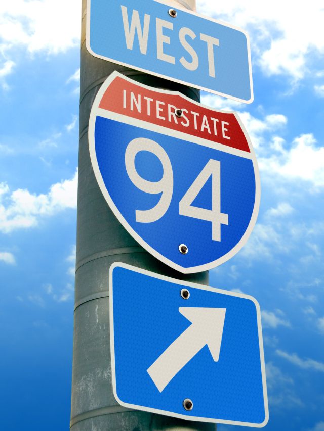 West interstate 94 and interstate 95 signs on a pole.
