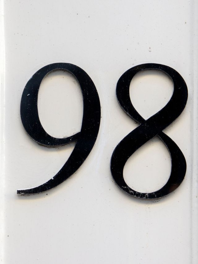 The number 89 is shown on a glass door.