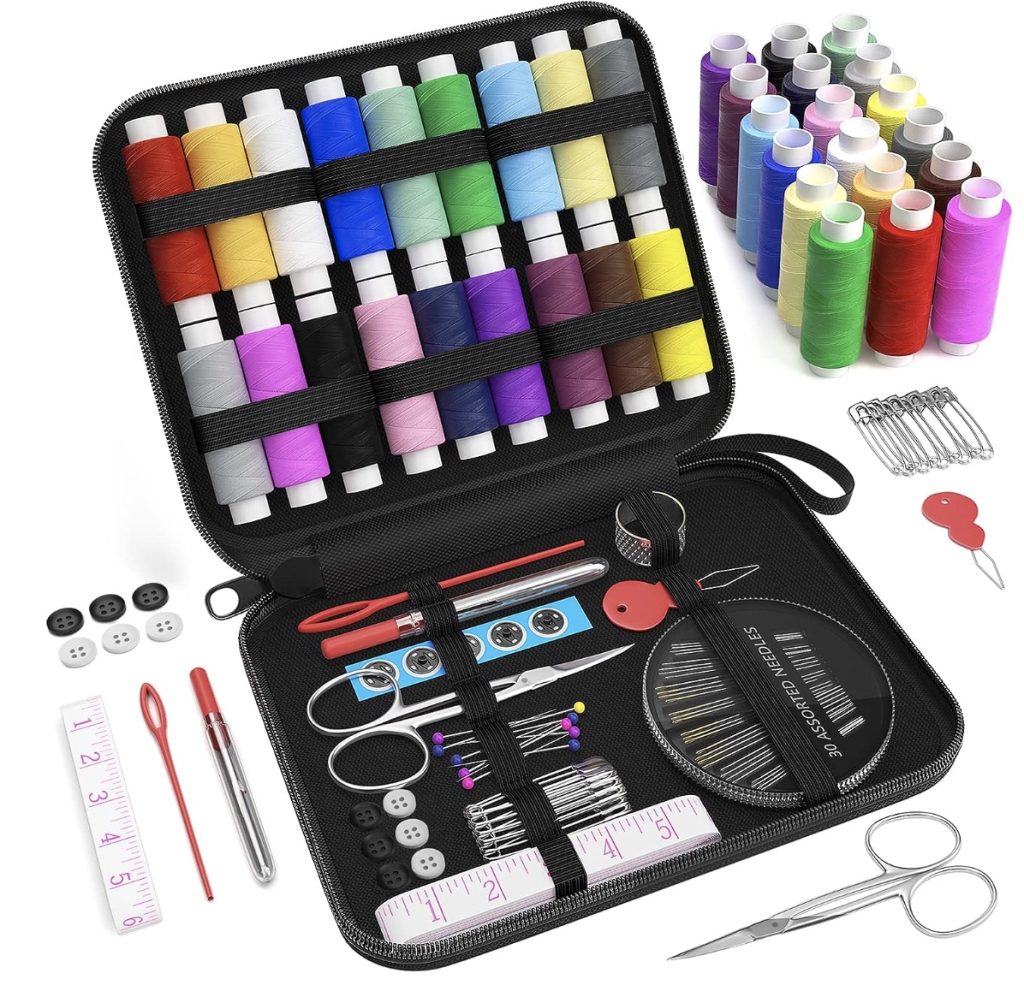 A Christmas gift idea for quilters with a variety of threads, needles, and scissors in a sewing kit.