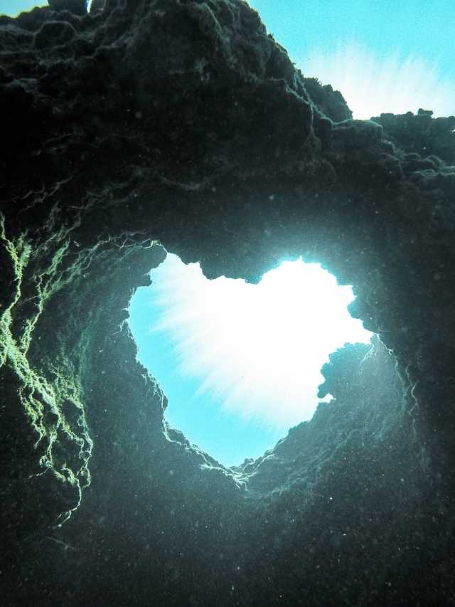 A heart shaped hole in the ocean.