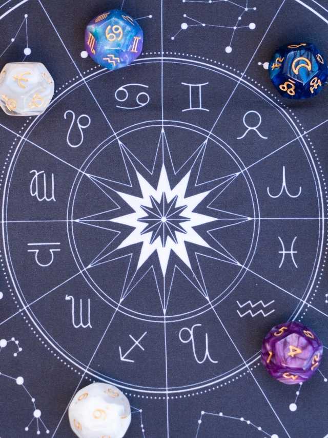 A board game with zodiac symbols on it.