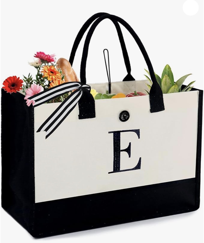 A black and white shopping bag with the letter e, perfect for gifting during Christmas as a present for your nanny.