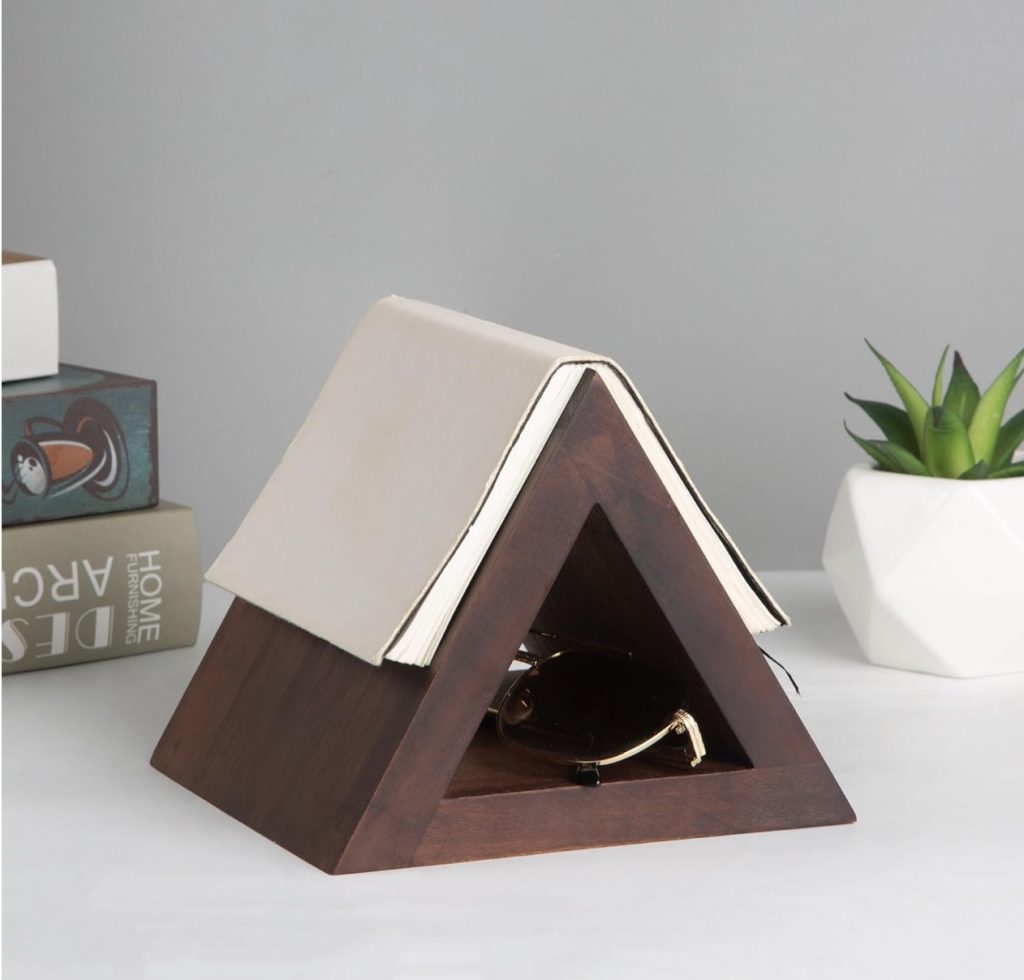 A wooden book holder with a unique triangle design, perfect for gifting to your son-in-law at Christmas.