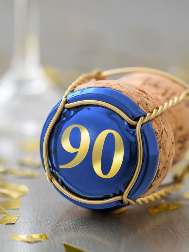 A champagne bottle with the number 90 signifying a spiritual meaning.