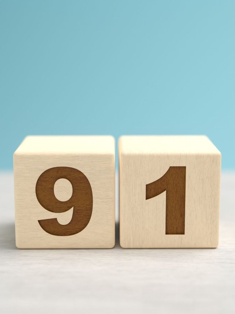 Two wooden blocks with the number 991, representing angel number 90 meaning.