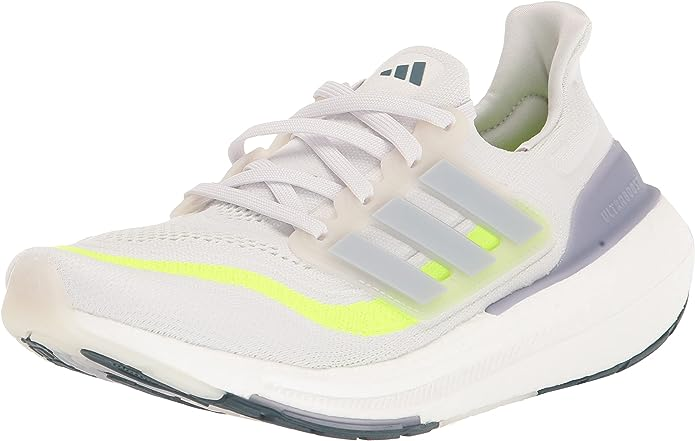 The best Adidas ultraboost running shoes for women in white and yellow.