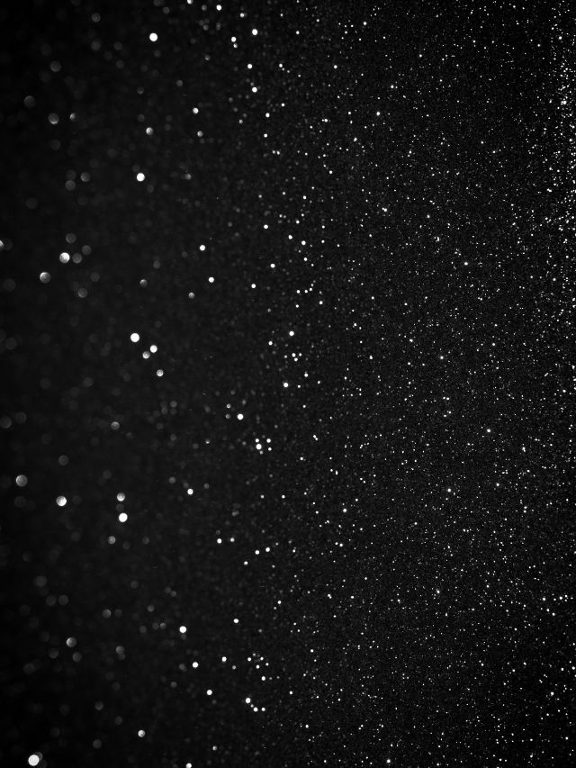 A black and white photo of a starry sky.