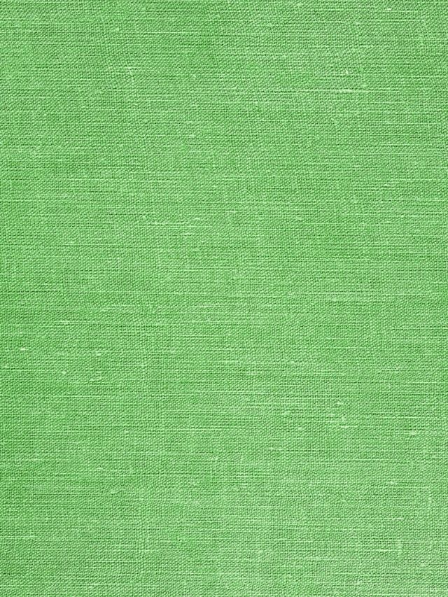 A close up image of a green fabric.