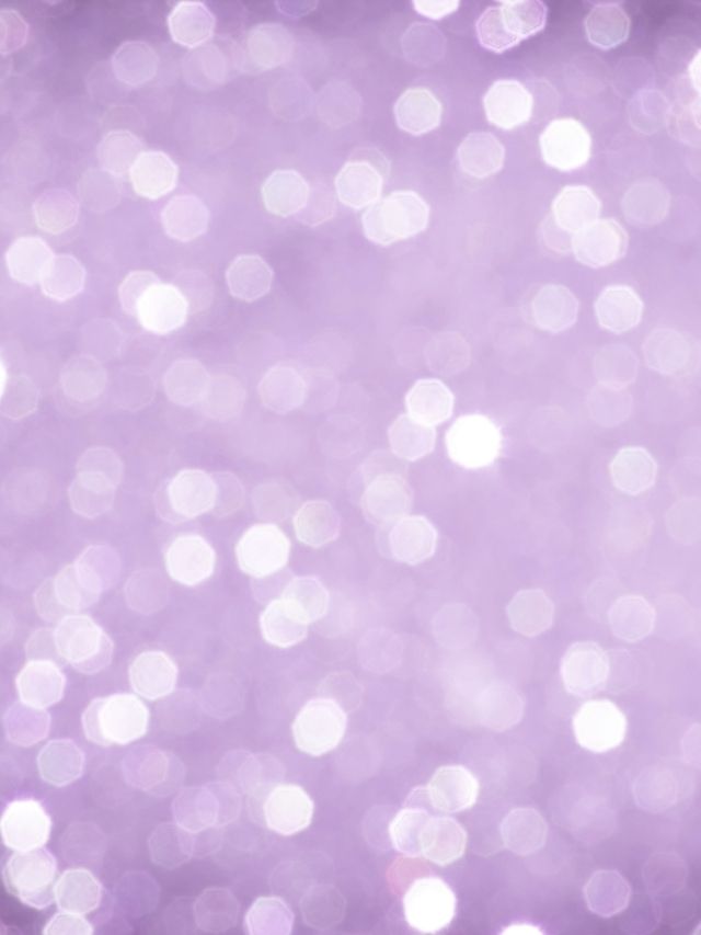 Purple glitter bokeh background.