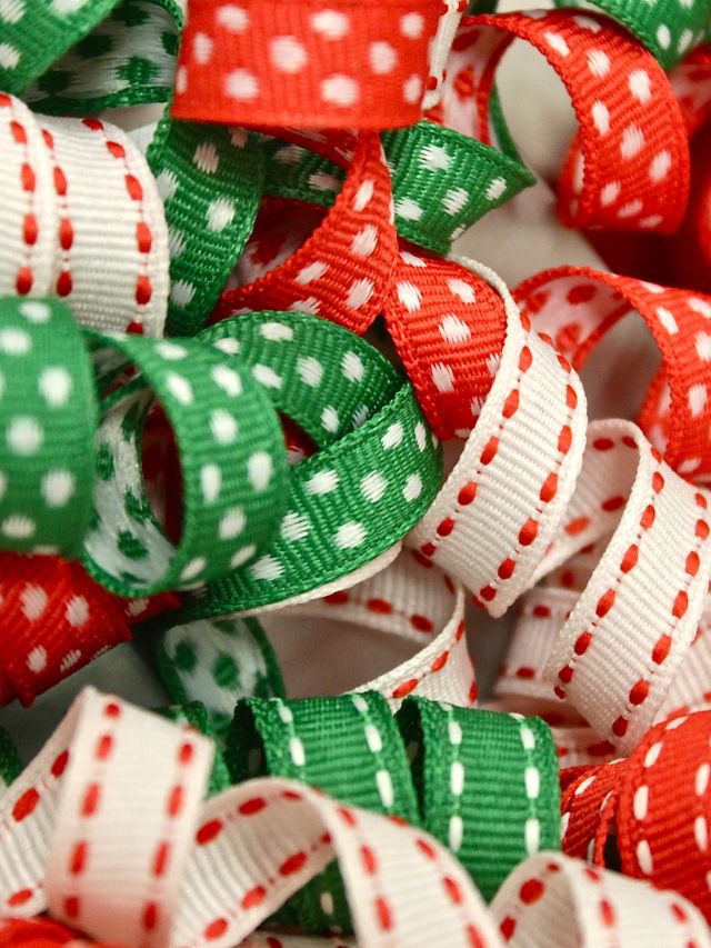 A pile of red, green and white polka dot ribbons.