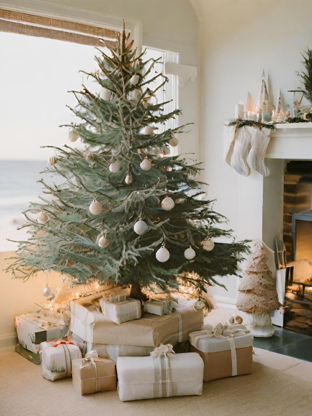 A christmas tree with presents in front of a fireplace.