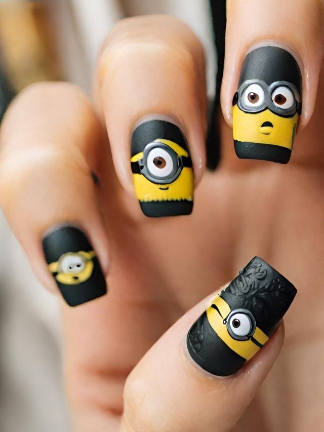 A person is holding up a pair of nails with minions on them.