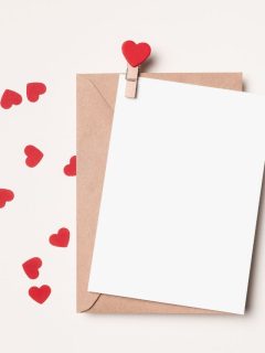 Valentine's day card with red hearts on a white background.