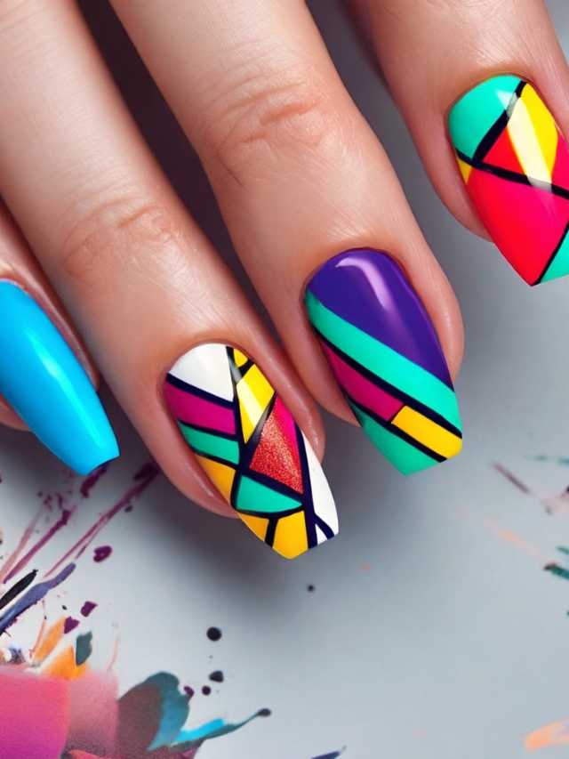 A woman's hand with colorful nail designs.