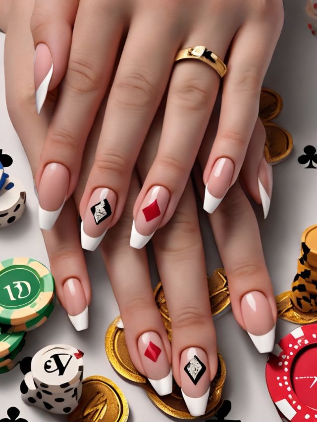 A woman's nails with casino chips on them.