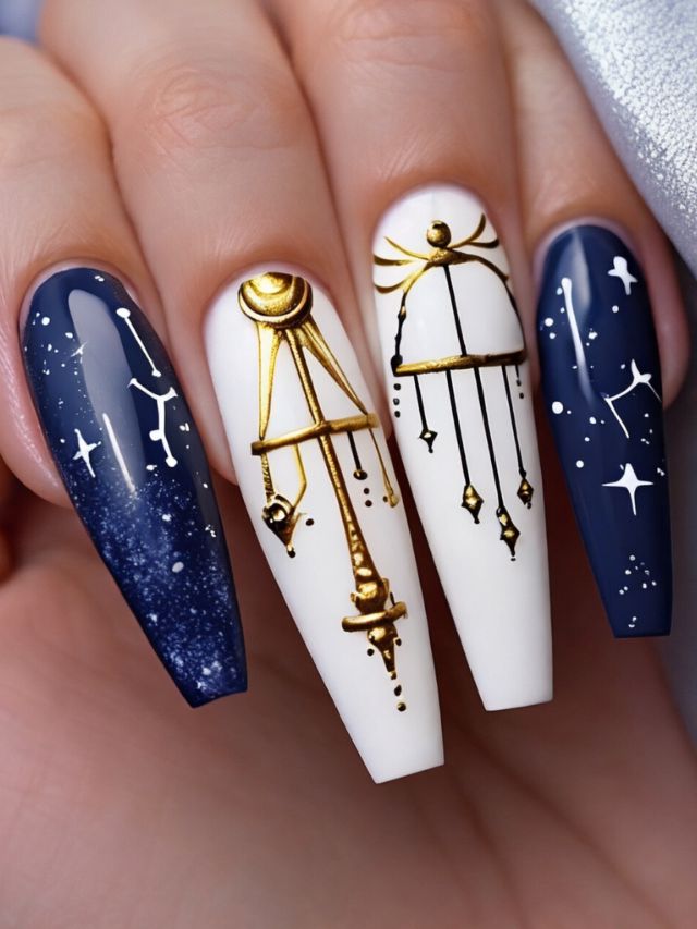 A woman's nails are decorated with stars and constellations.