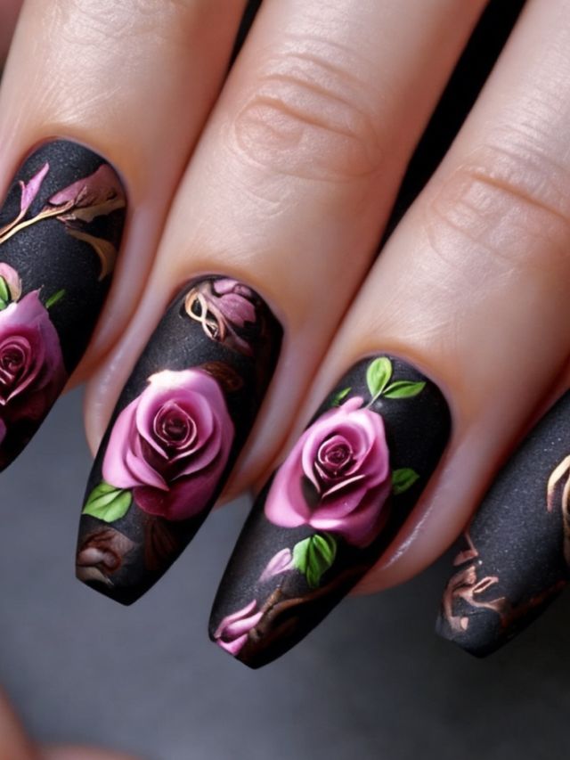 A woman's nails are decorated with roses and flowers.