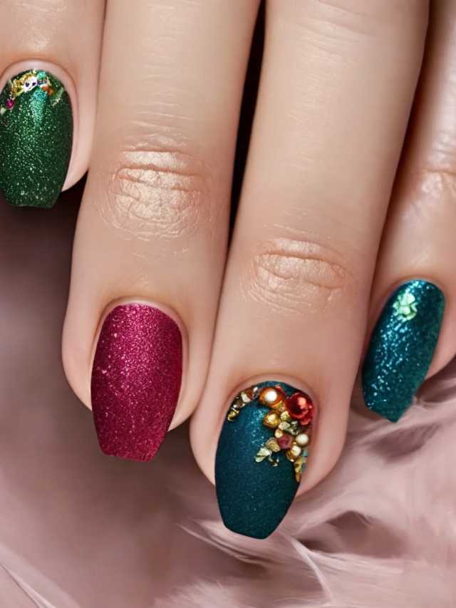 A woman's hand with green, blue, and red glitter nails.