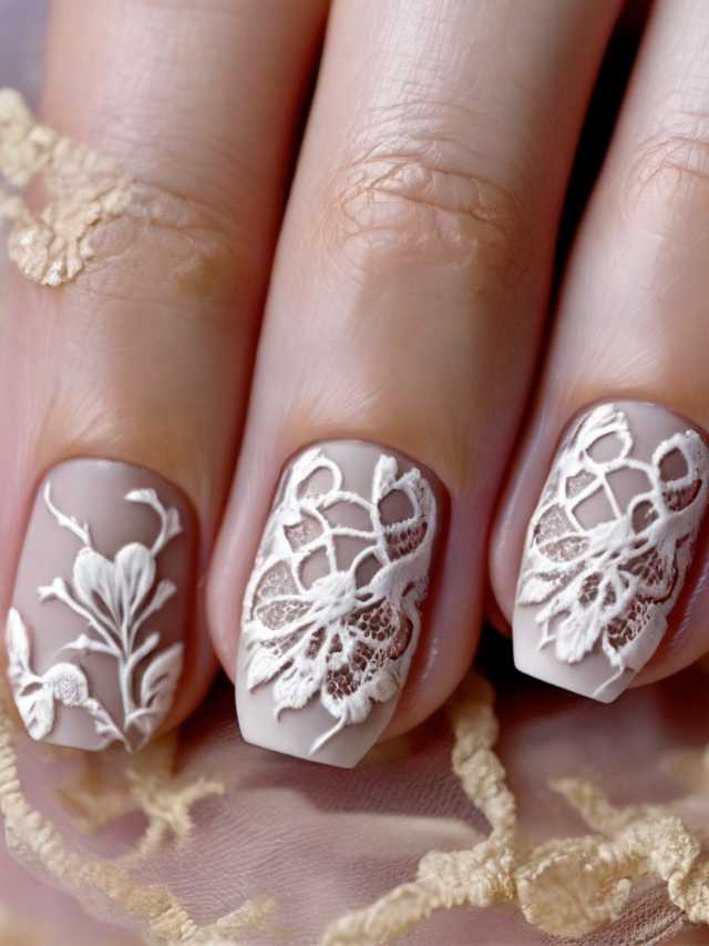 A woman's nails with white lace on them.