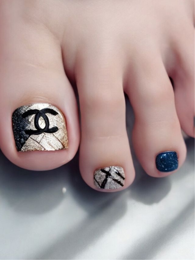 Chanel toe nail art.