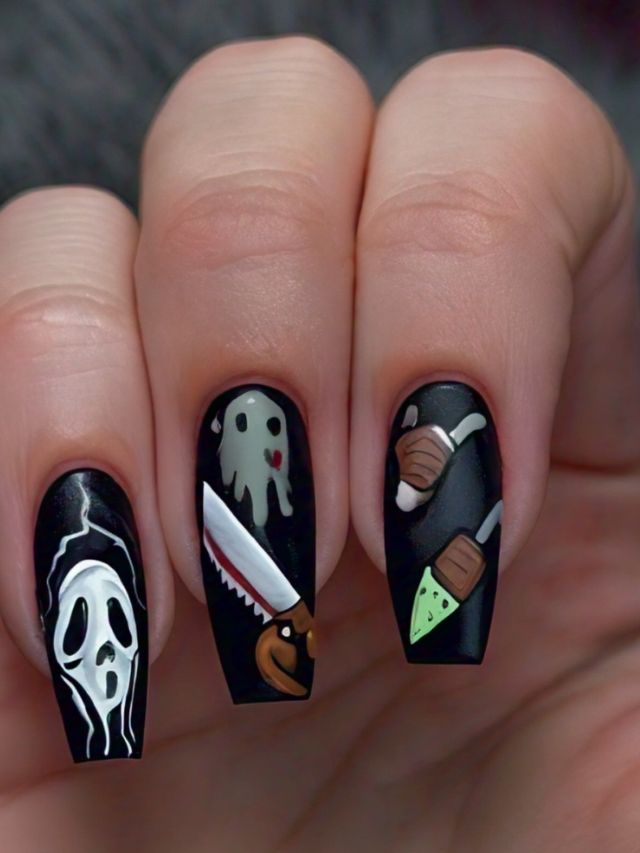 Spooky nail art with ghosts and skeletons.