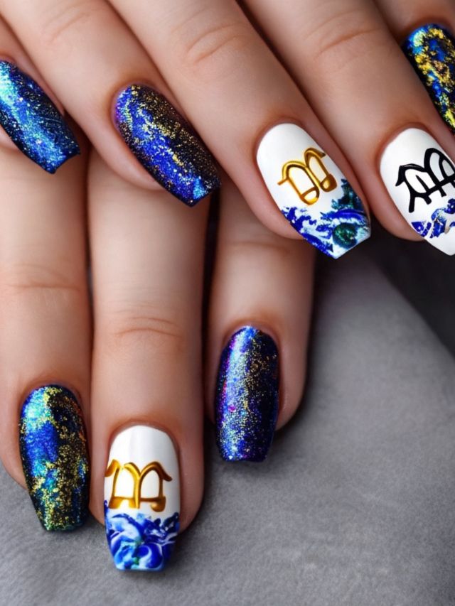 A woman's nails with blue and gold designs.