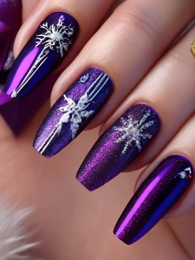 Purple nails with snowflakes on them.