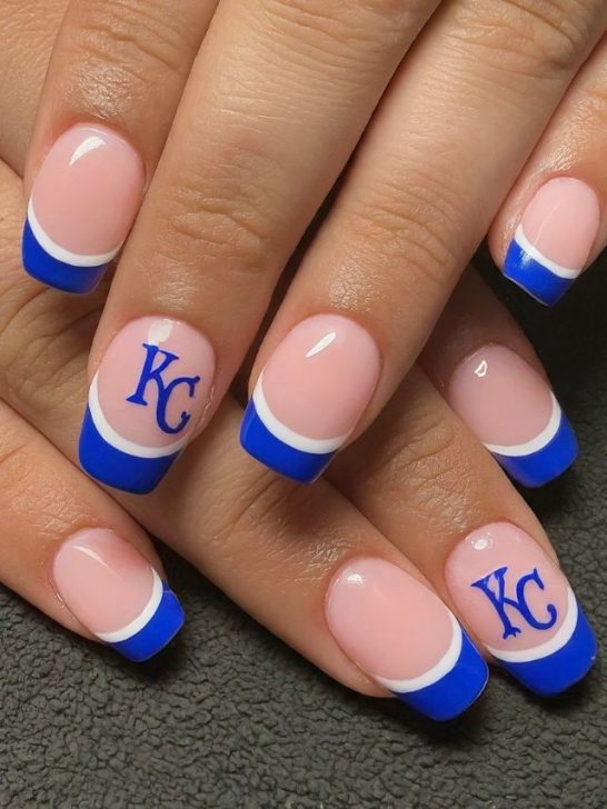 Kansas City Royals nail design featuring the team's logo and colors. Perfect for any Royals fan!