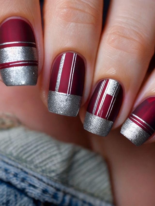 Maroon and silver nail art.