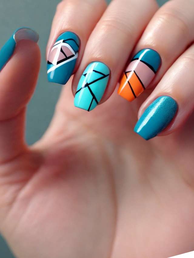 A woman's hand holding a blue and orange nail design.