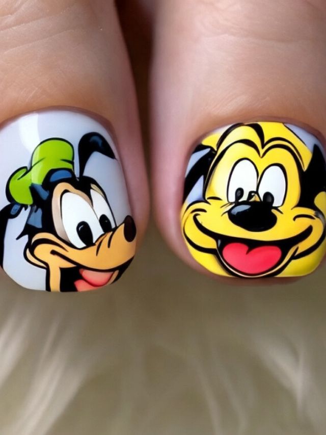 A person's toenails are decorated with disney characters.