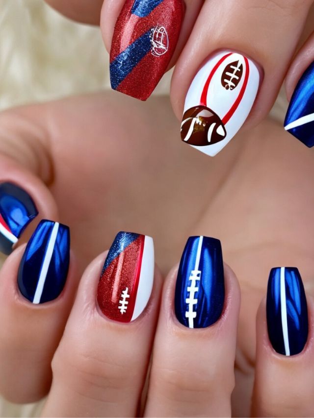 A woman's nails with a Buffalo Bills football design.