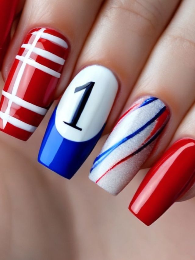A woman with red, white and blue nail designs with a number on them, representing her love for the Buffalo Bills football team.