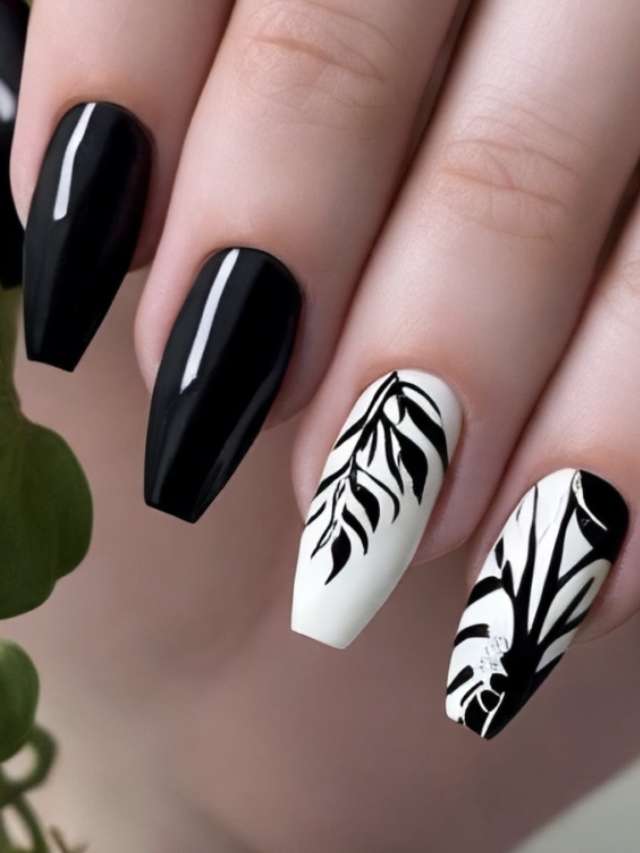 Black and white nails with leaves on them.