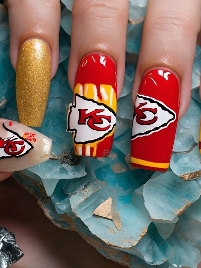 A close up of Kansas City Chiefs nail designs.