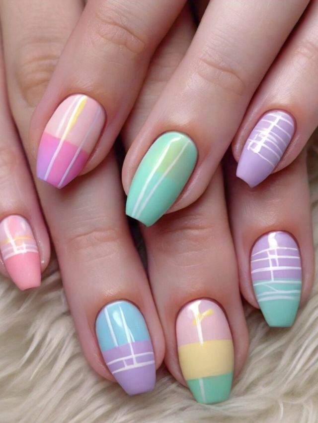 A woman's hand adorned with inspiring nail designs and vibrant Easter colors.
