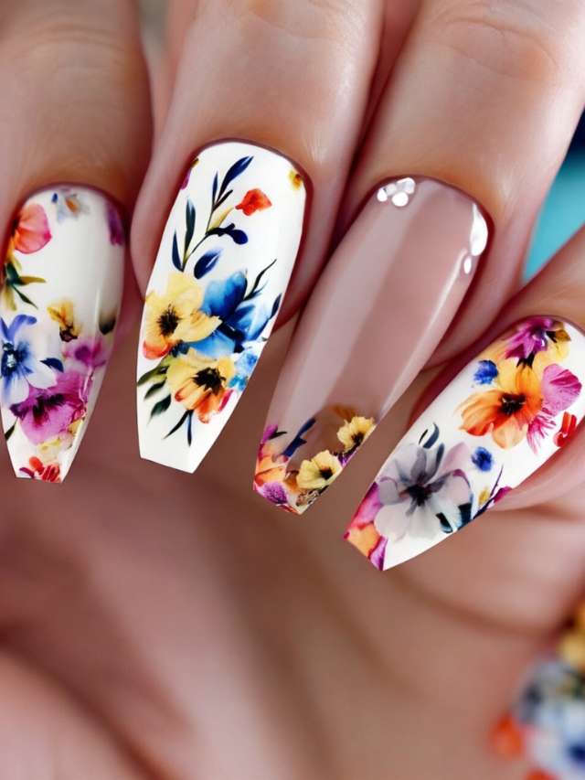A woman's hand with colorful floral nails.