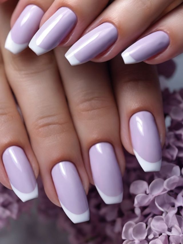 Lilac nails with white tips in a nail design on a woman's hand.