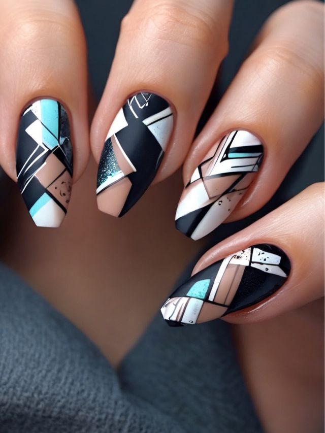 A woman's nails with geometric designs inspired by the latest nail trends in January.