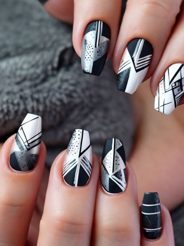 Geometric nail designs in black and white.
