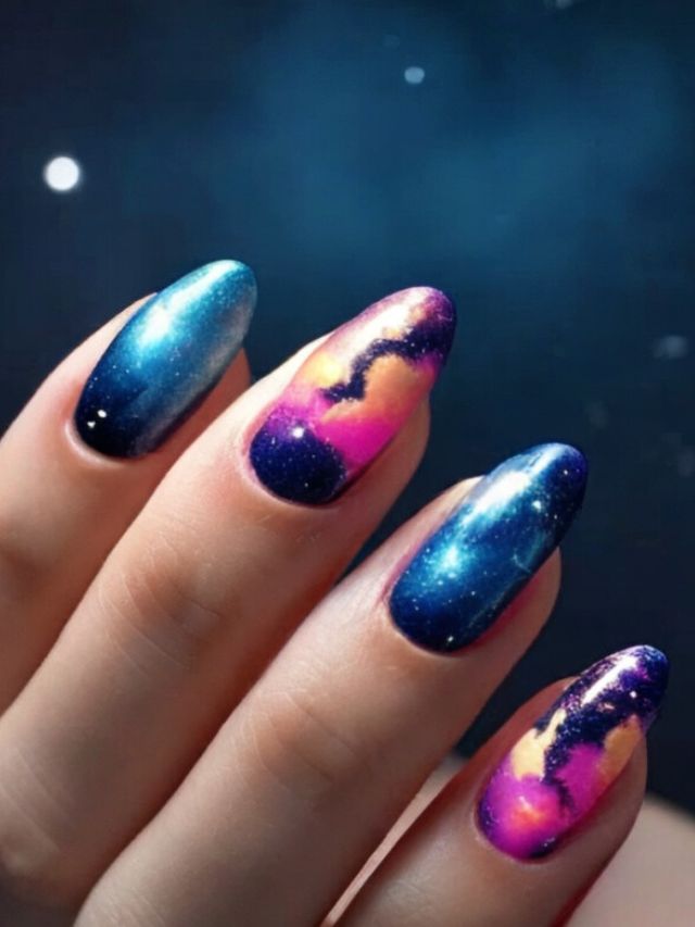 A woman's nails with a cute galaxy design.
