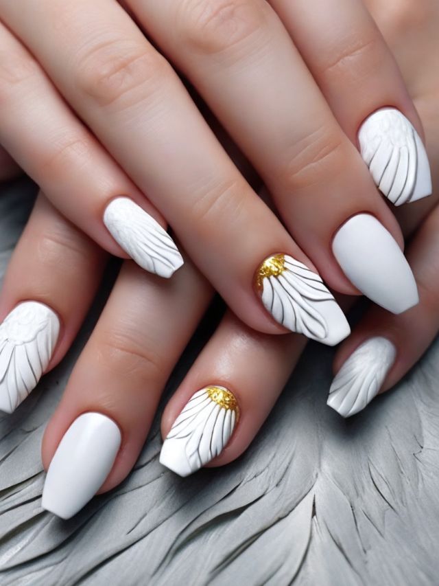A woman's hands showcasing the best white and gold nail ideas.