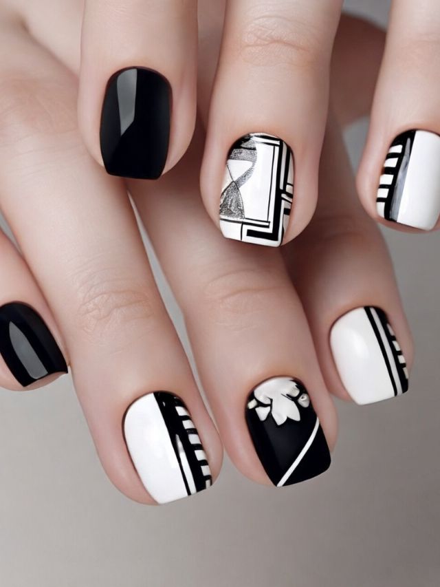 A woman with black and white designs on her nails.