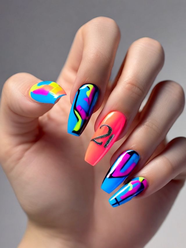 A woman's nails with colorful designs on them.