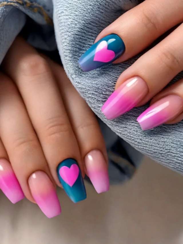 A woman with pink and blue ombre nails holding a denim jacket.
